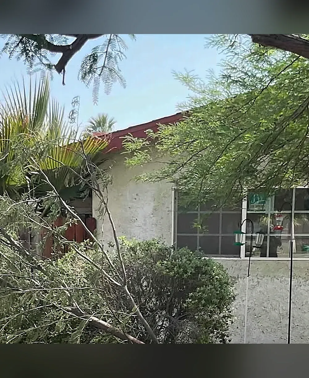 Fix All That handyman working on a home repair
